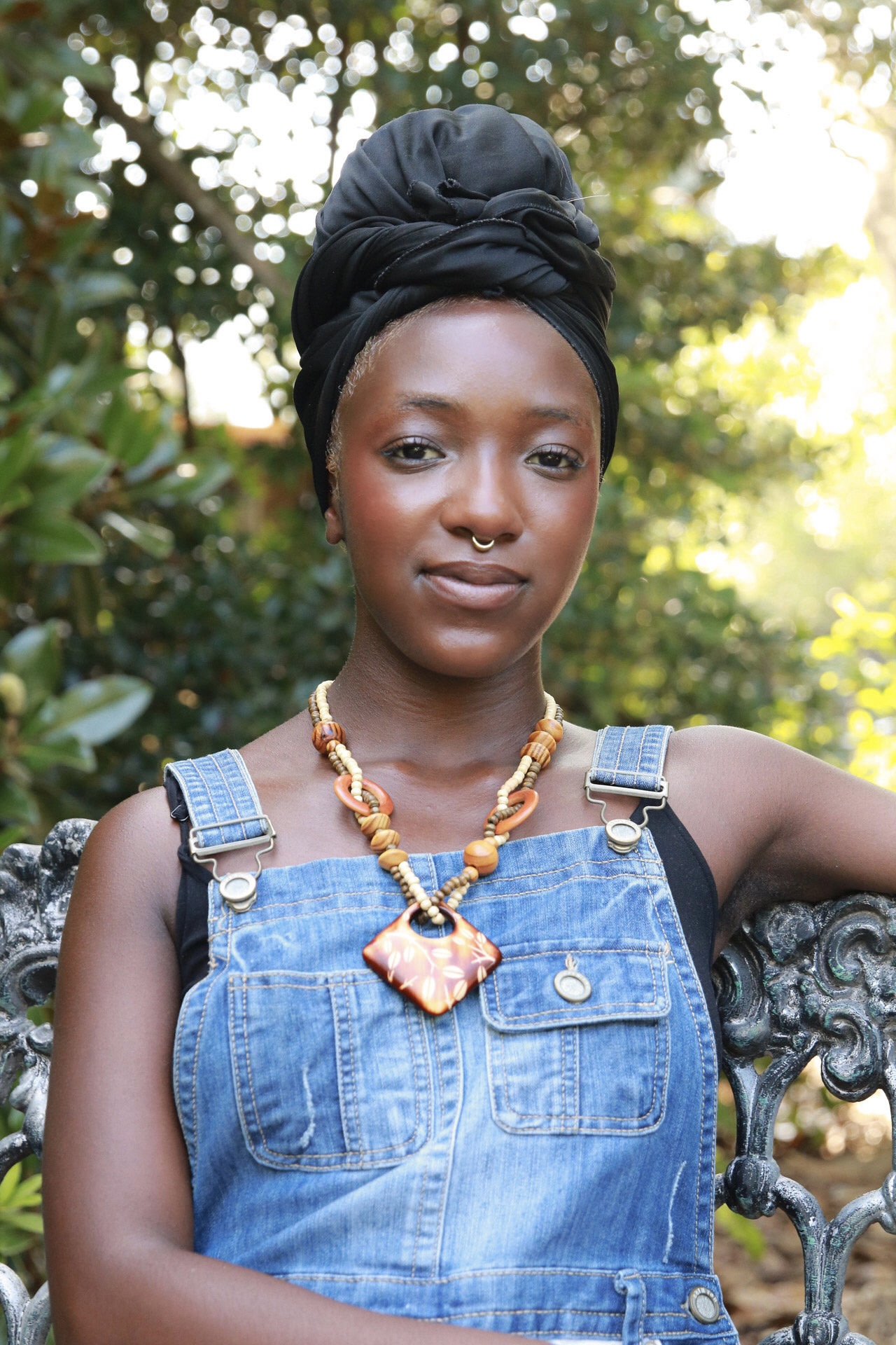 Amauriah standing outdoors in denim