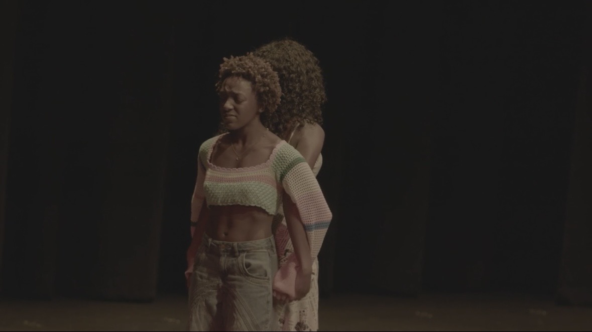 Solo stage still of Amauriah in soft light