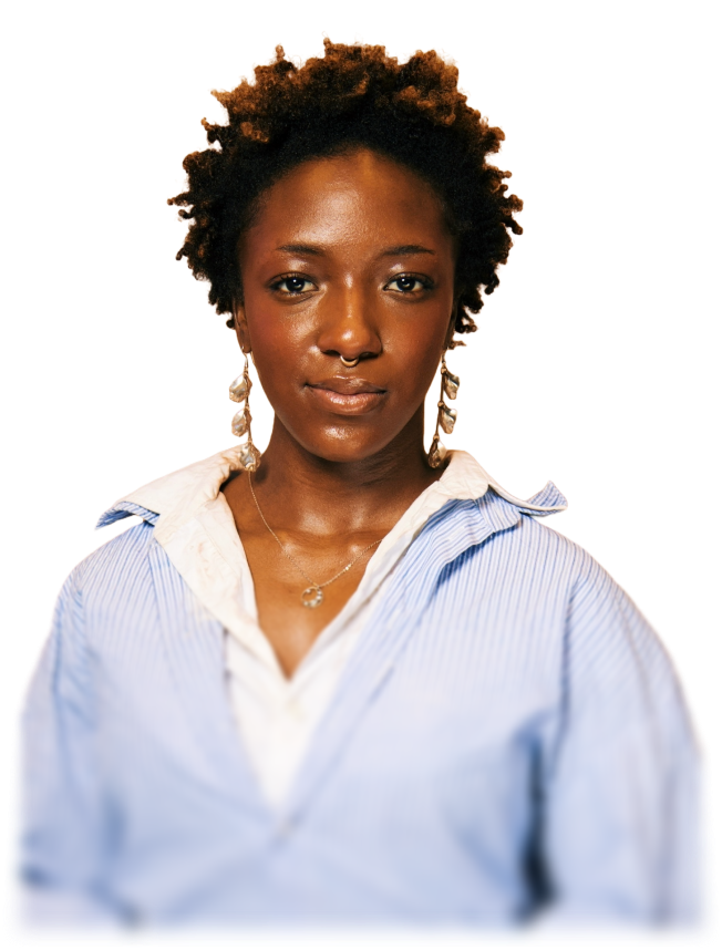 Amauriah Davis facing camera in a light blue shirt against a warm orange background